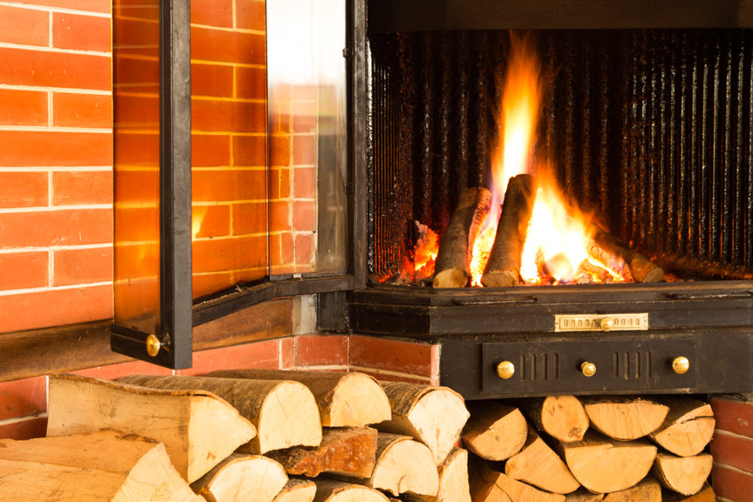 Hot wood fire burning in a chimney insert